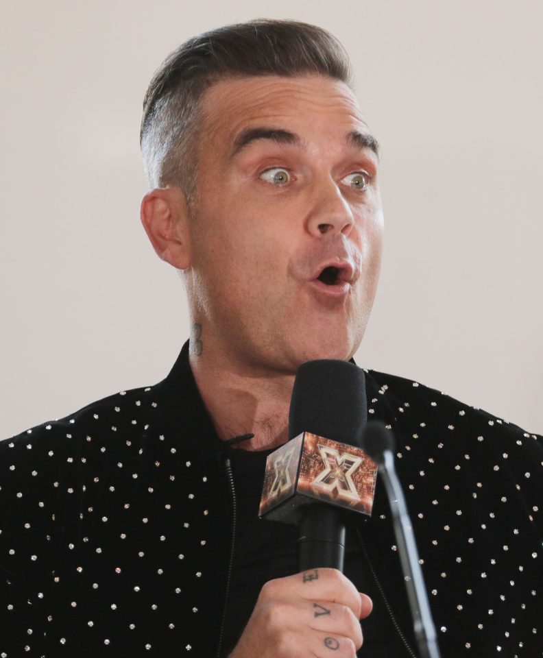  Robbie Williams has told of his strange obsession with ghosts which started as a child