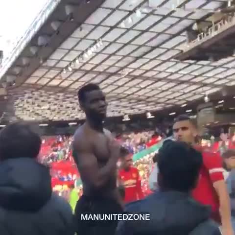  Pogba smiled and shrugged as he received abuse from some in the Stretford End