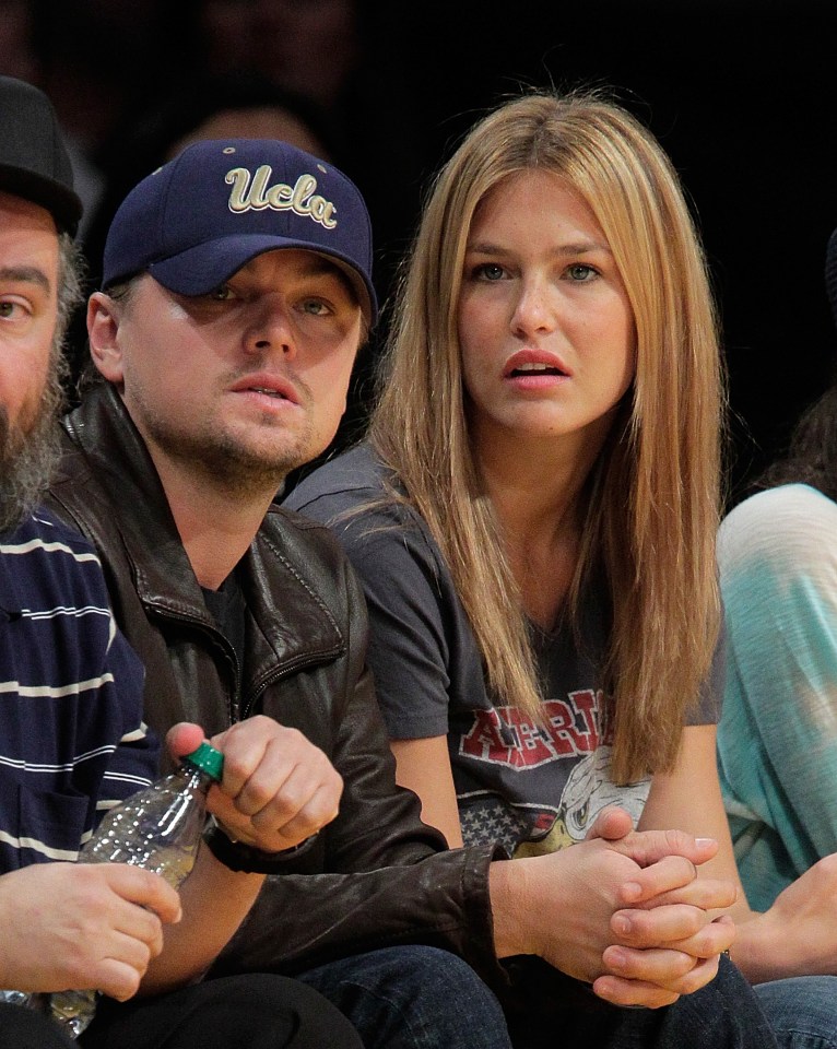  Leonardo DiCaprio and his then-girlfriend Bar Refaeli attend a game between the Orlando Magic and the Los Angeles