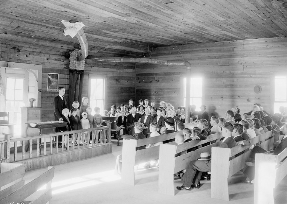 Reverend Lovelace and some children from an orphanage conduct the Sunday afternoon service, October 1933 in Tennessee