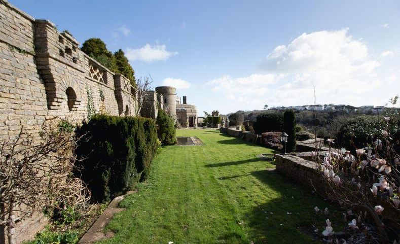 Vast lawns surround the huge property