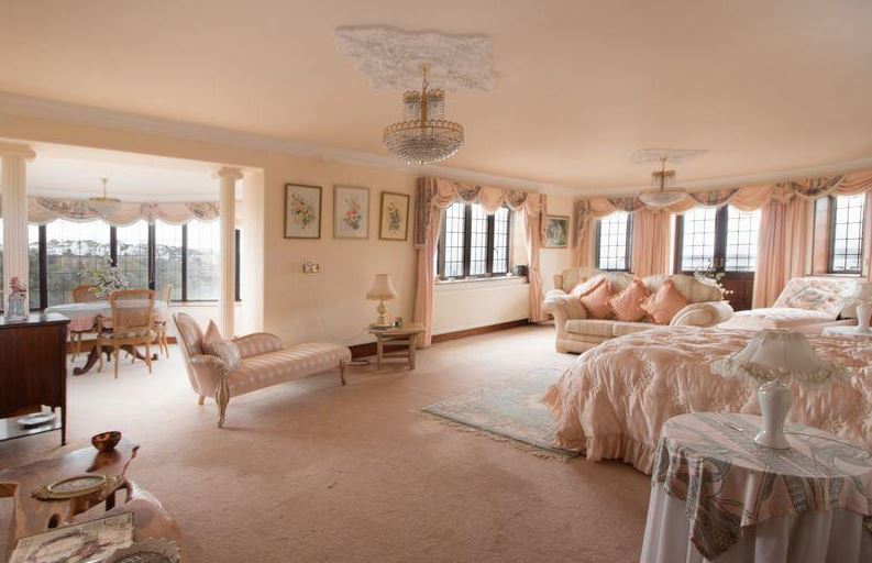 The huge master bedroom has a dressing room and en suite