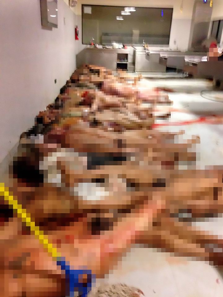  Horrifying images show bodies piled up in a morgue overflowing with corpses