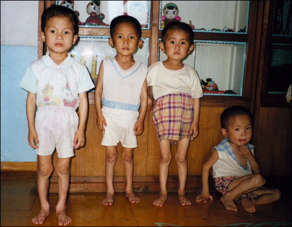  These starving children were snapped during the North Korean famine in the 1990s