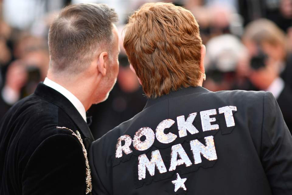  The legendary singer wore a specially made tux with sequinned writing on the back