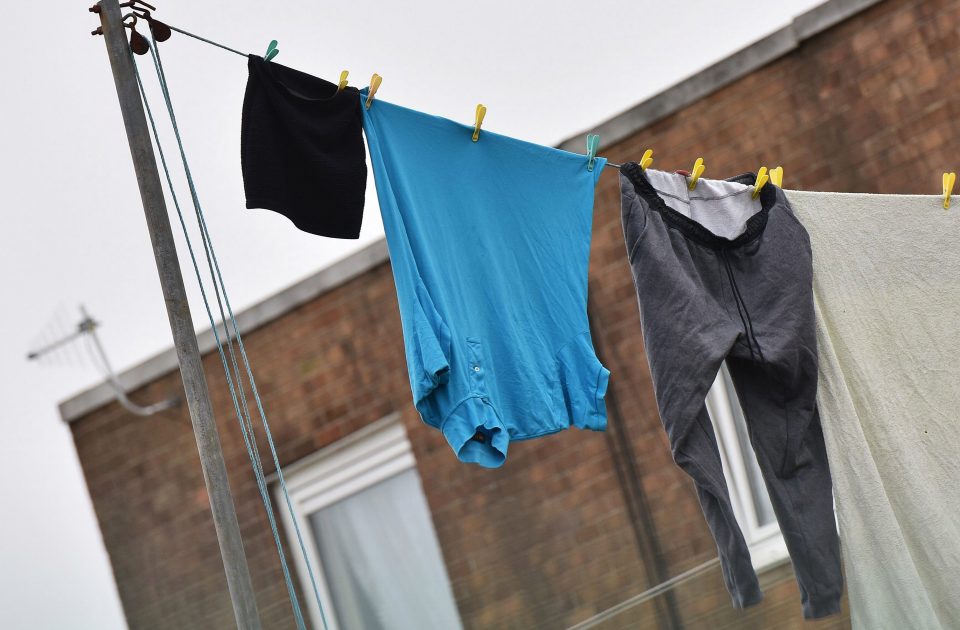  A T-Shirt and tracksuit trousers identical to the ones worn by the fan at Fratton Park hang on the washing line at the home of David Oppitz today