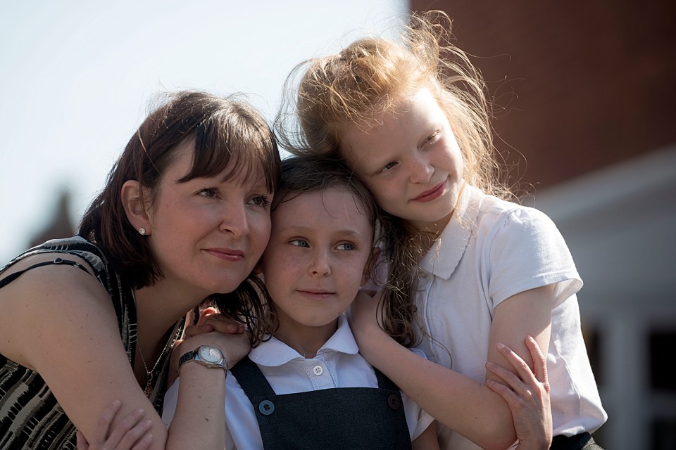  Mum Claire, left, with sister Ebony, right and Scarlett, centre