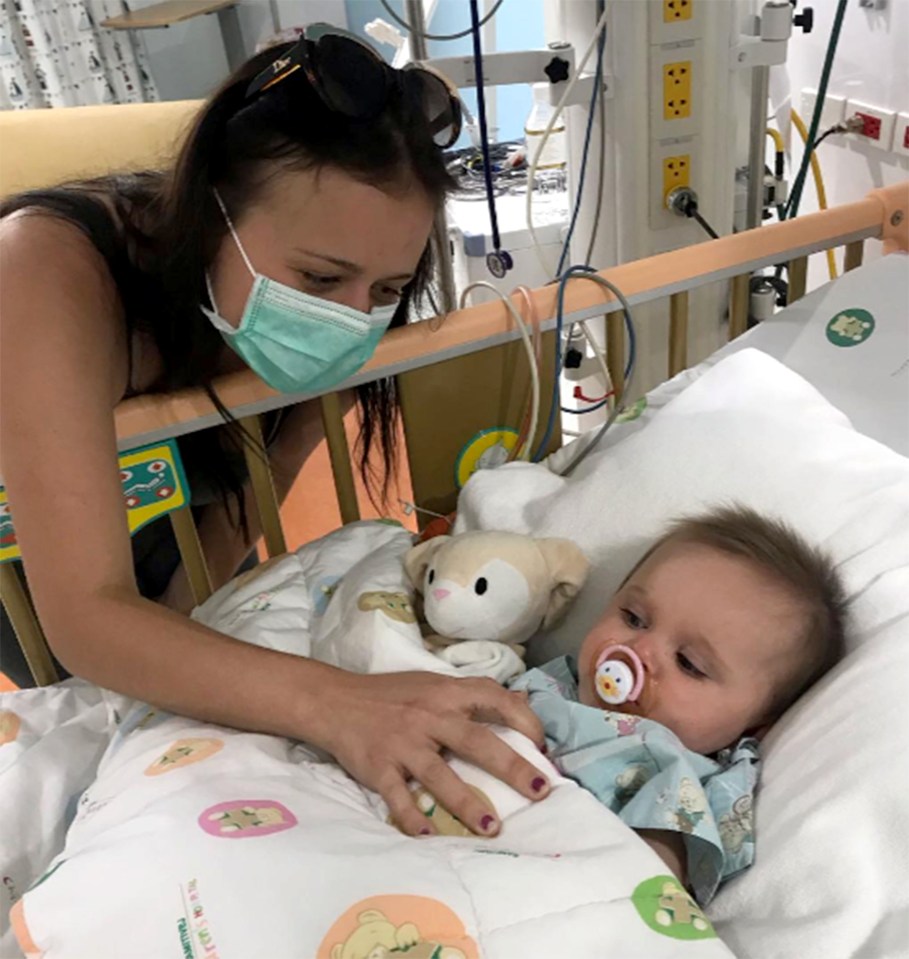  Elisha and her baby daughter in the Thai hospital