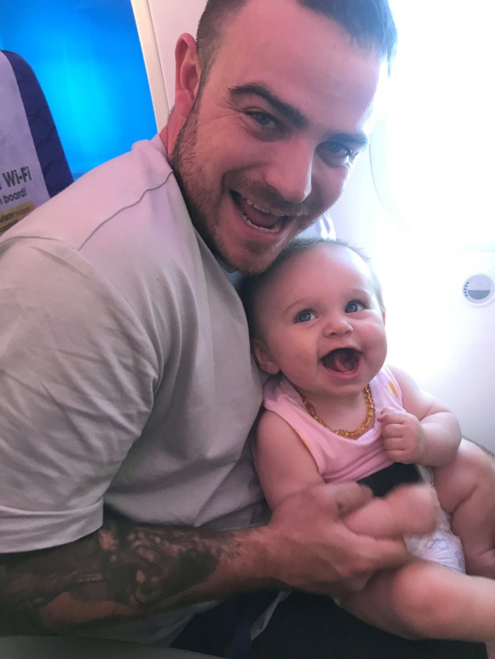  Jai with his daughter Lilliana on the plane going to Thailand