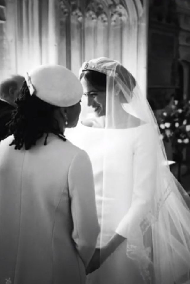  The unseen snaps of the Sussex wedding saw Meghan sharing an intimate moment with her mum