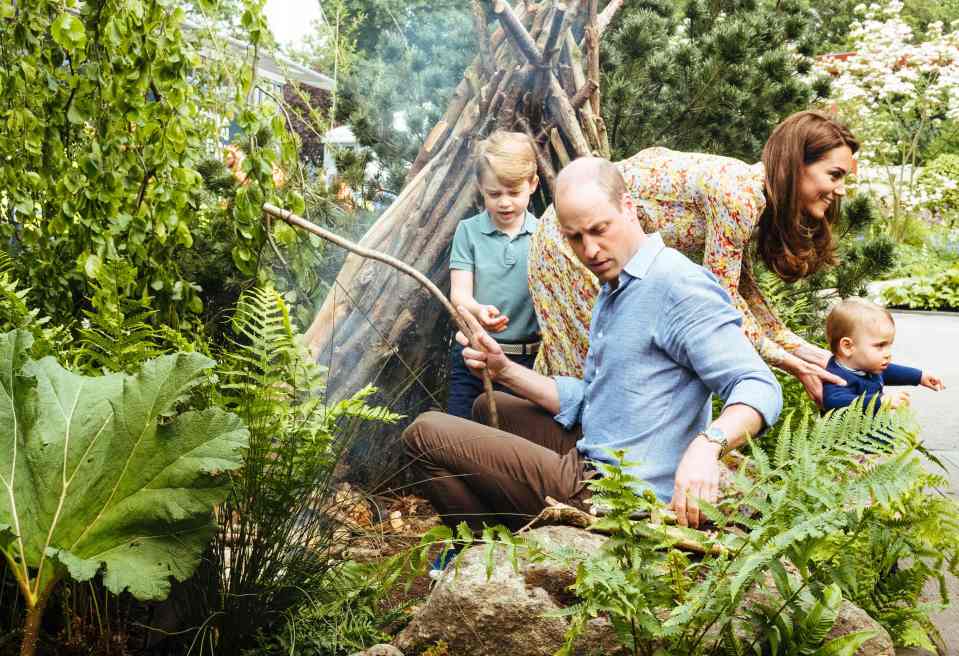  Prince George and Prince William explore the delights of the garden, which include a treehouse and an area to toast marshmallows