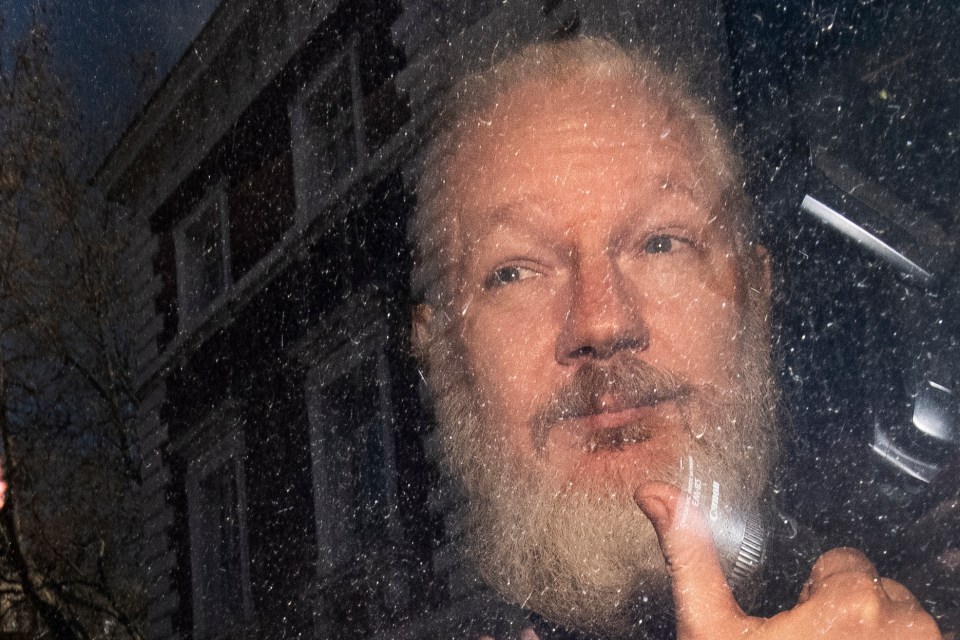  WikiLeaks founder Julian Assange is seen in a police van after was arrested at the Ecuadorian embassy in London