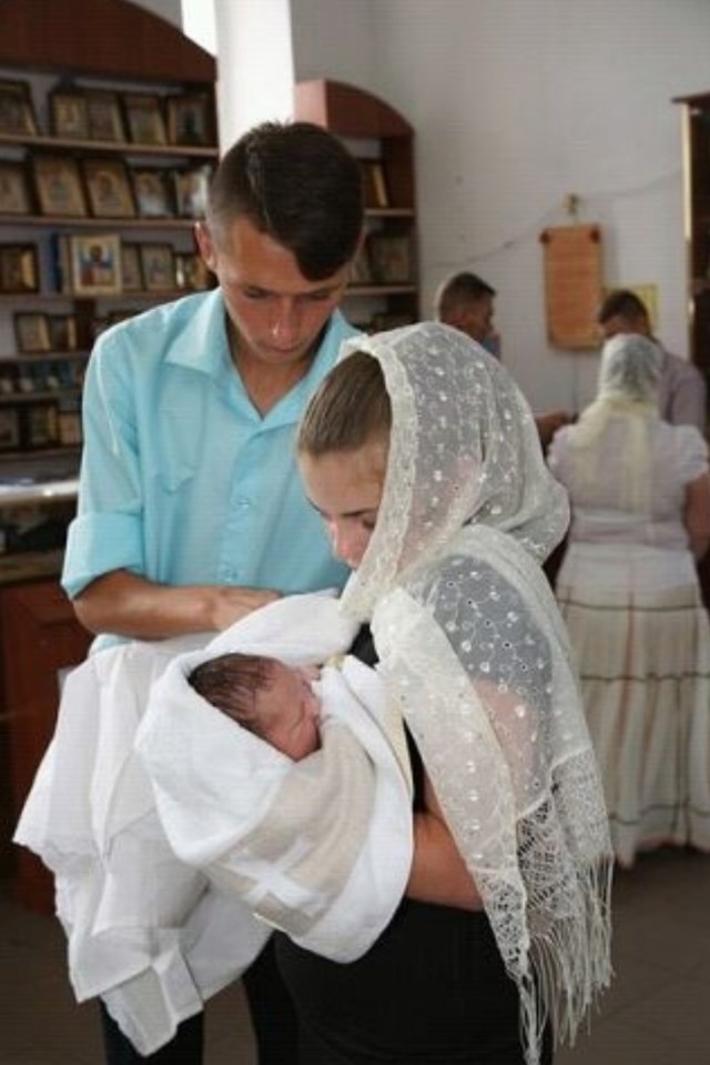  Maria with her daughter Arina, not long after giving birth