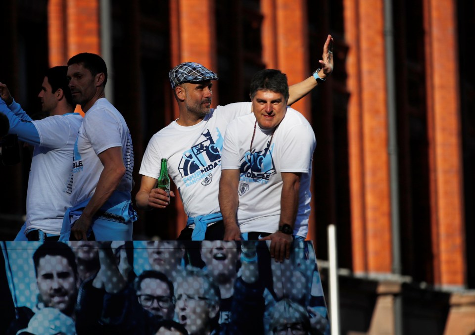  Pep Guardiola enjoyed a beer as he waved to the huge crowd of fans