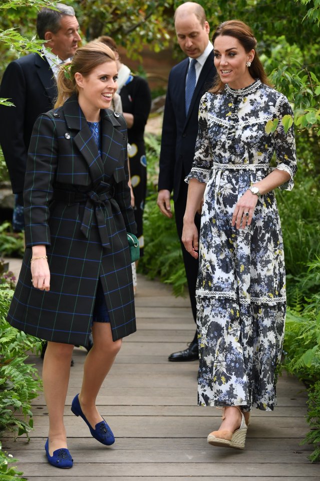  Princess Beatrice chats with Kate as they look around her display