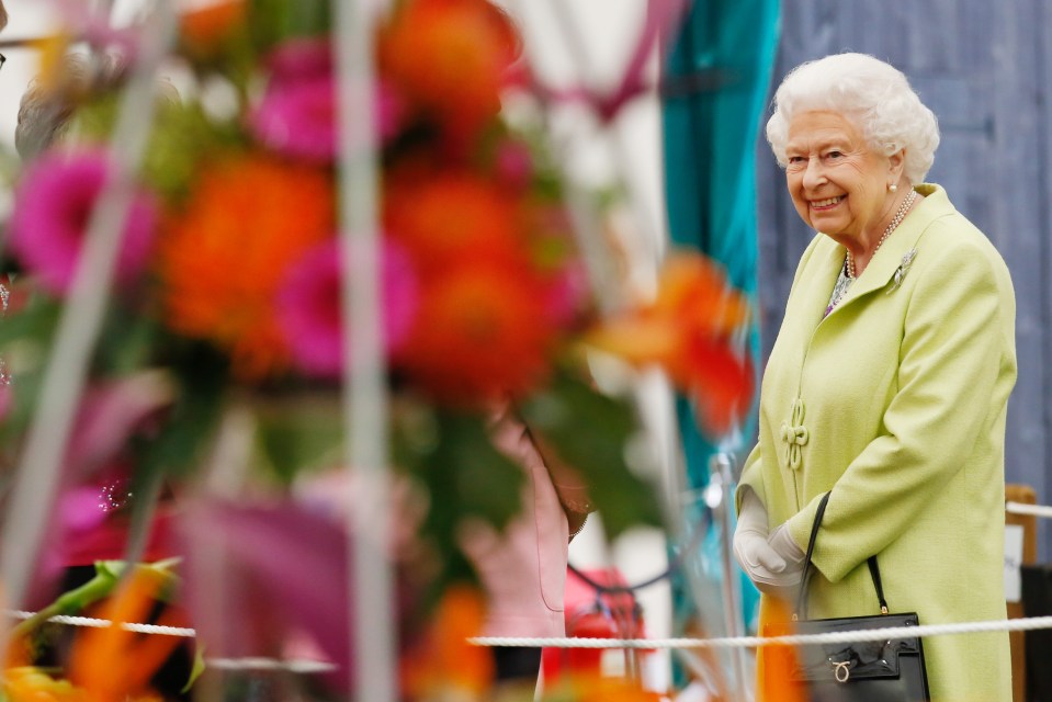  She smiled as she took in the outstanding floral displays