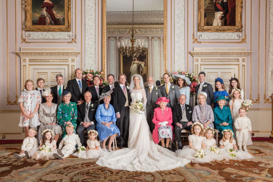  Lady Gabriella Windsor poses with the Queen, Prince Philip and other members of the Royal Family on her wedding day