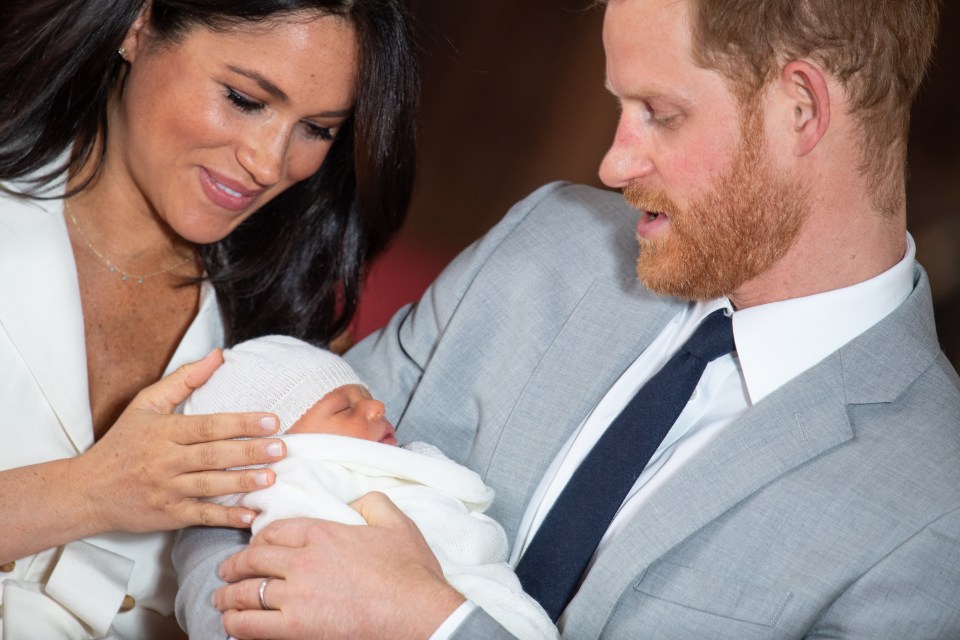  A close friend of the couple revealed that Prince Harry 'can't take his eyes or hands off' baby Archie