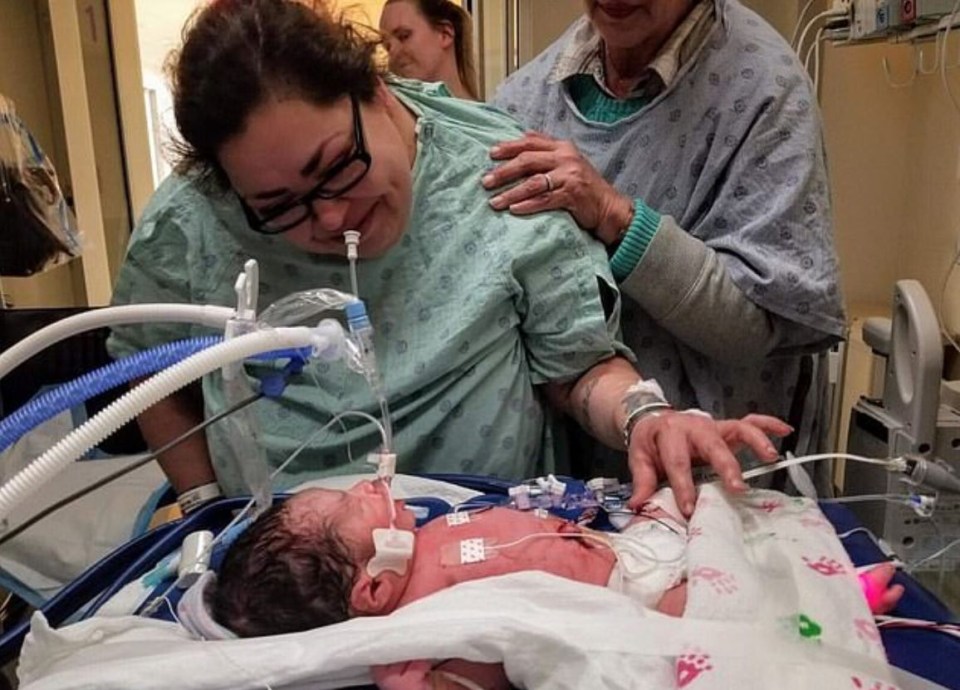 Clarisa Figueroa is seen smiling over murdered mum Marlen Ochoa-Lopez’ gravely ill baby in hospital. She tried to pass off the boy as her own child