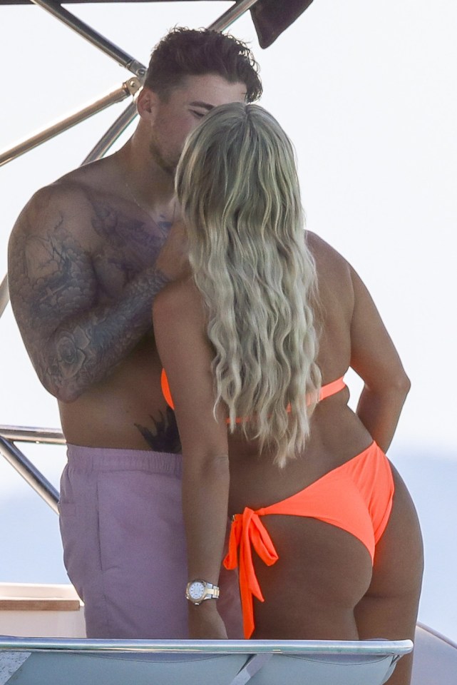  Amber Turner snogged new boyfriend Ed Crossan on a yacht in Ibiza yesterday