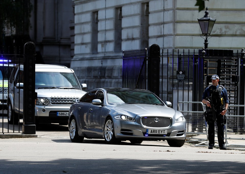 Mrs May driving to her Maidenhead constituency