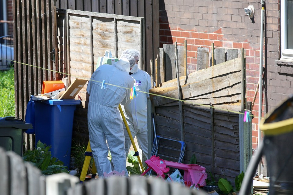  Forensic officers were seen at the back of the property