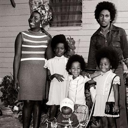  Cedella Marley, pictured bottom right with her dad Bob and the rest of the family when she was a child