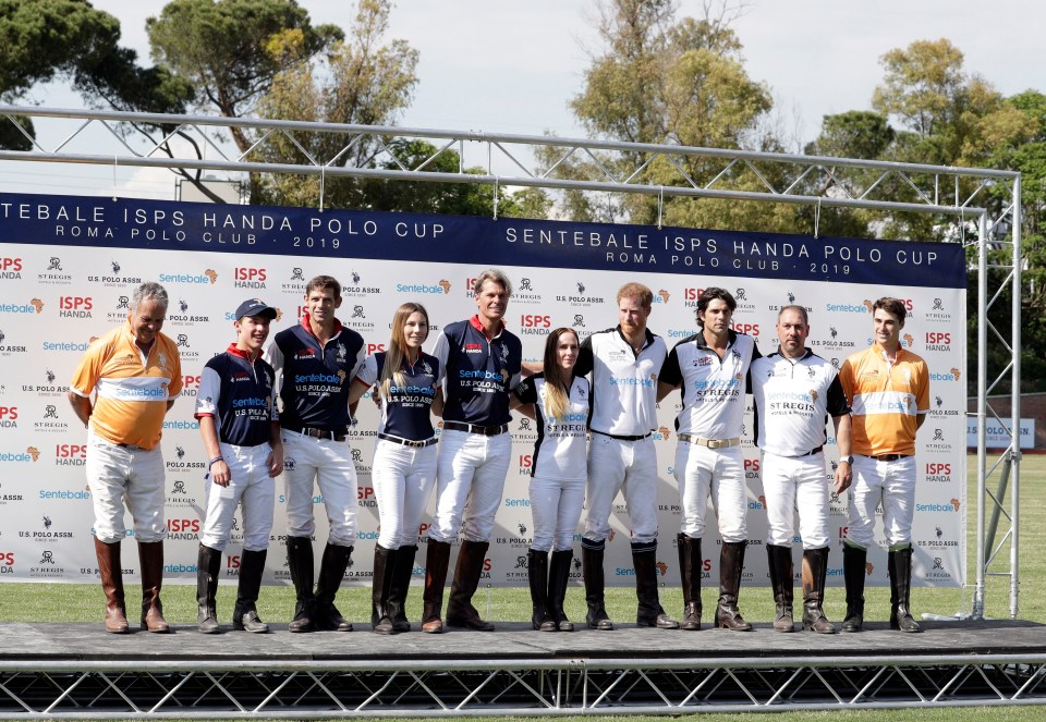  The polo team poses after the charity match at the Roma Polo Club in Rome