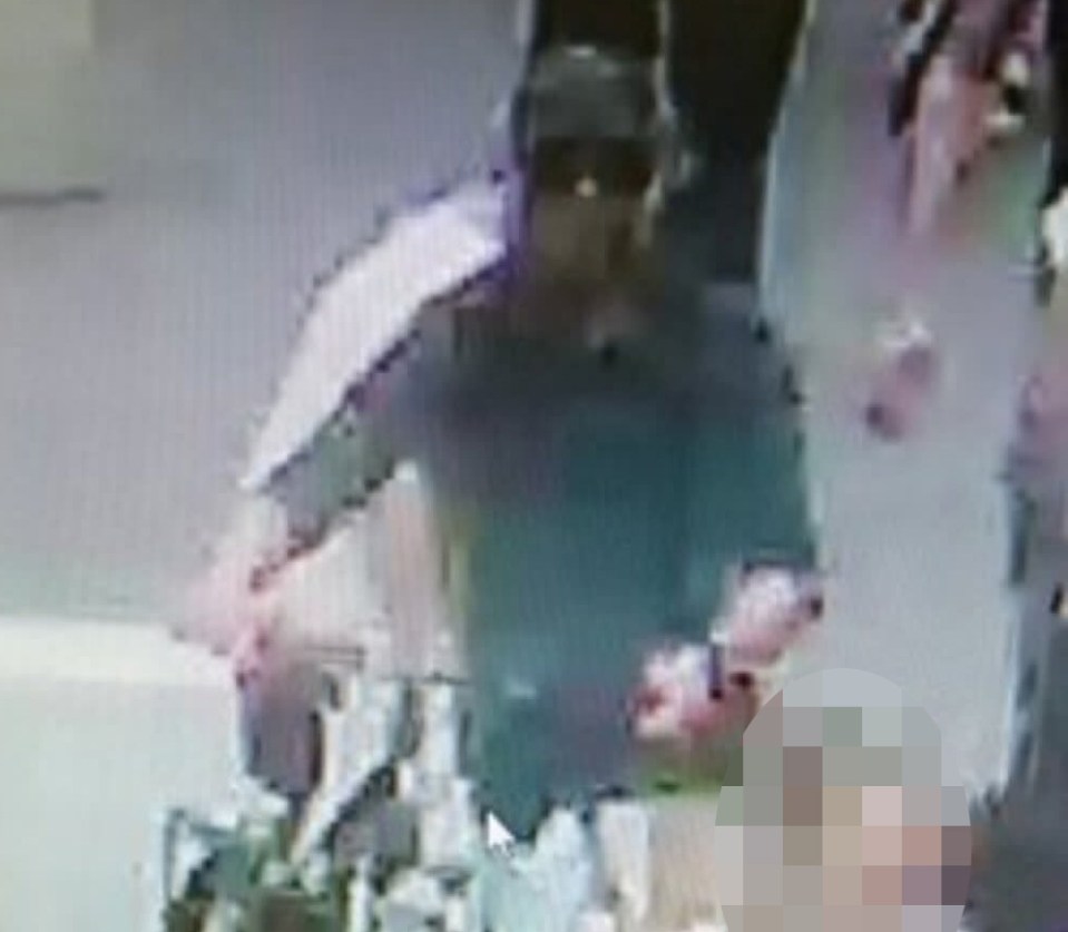  The masked suspect, seen placing at least one bag at the scene of the blast, captured on CCTV using a bicycle