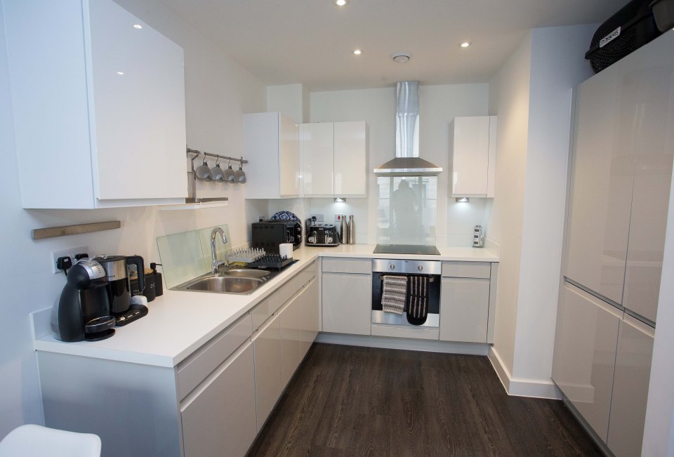  The flat is open-plan with a kitchen that opens up into the living room