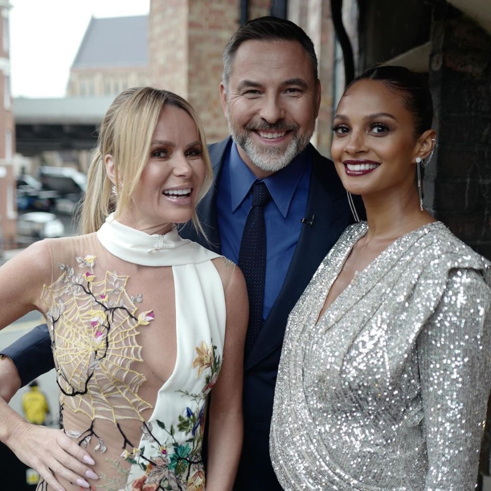  Her figure was on show as she posed with David Walliams and Alesha Dixon