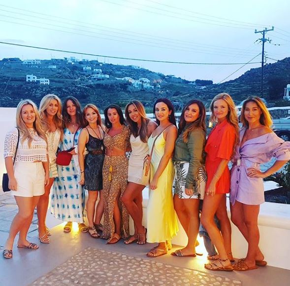  She also shared this picture of her close pals in front of a hillside backdrop