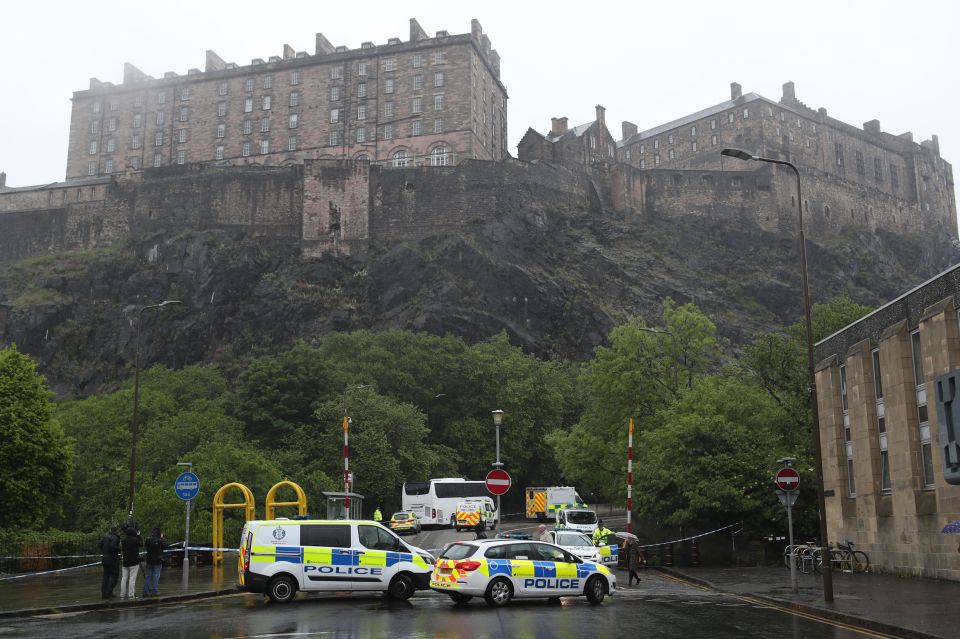  Police at the scene of the stabbing outside Edinburgh Castle this afternoon