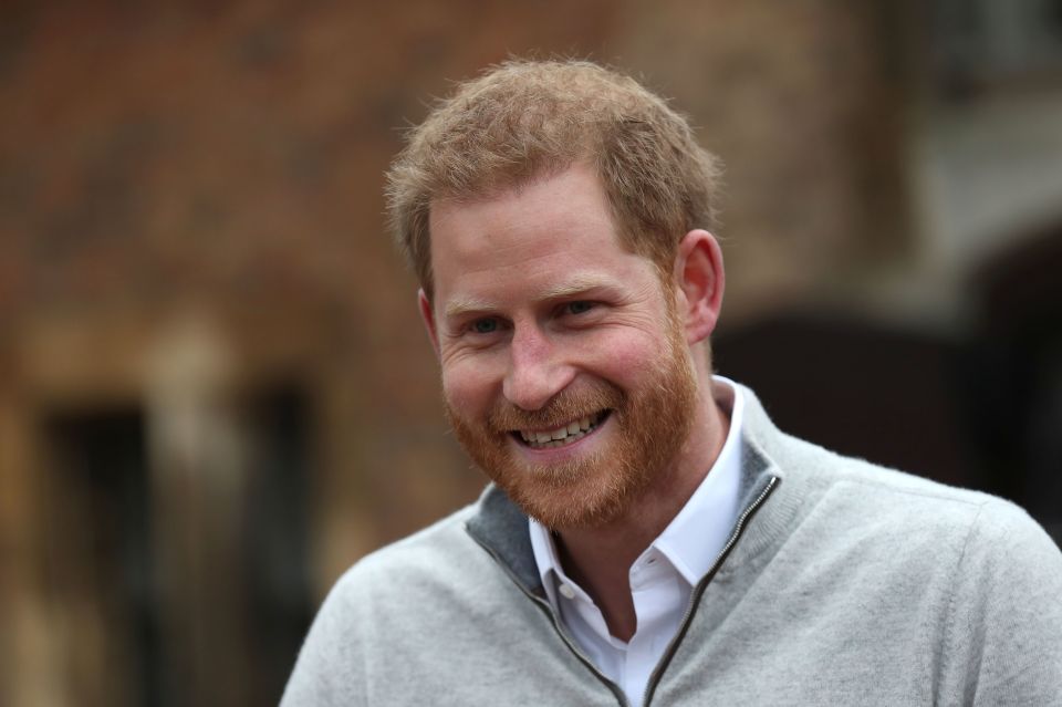  Prince Harry coudn't stop smiling as he gave an impromptu press conference about the birth of his son