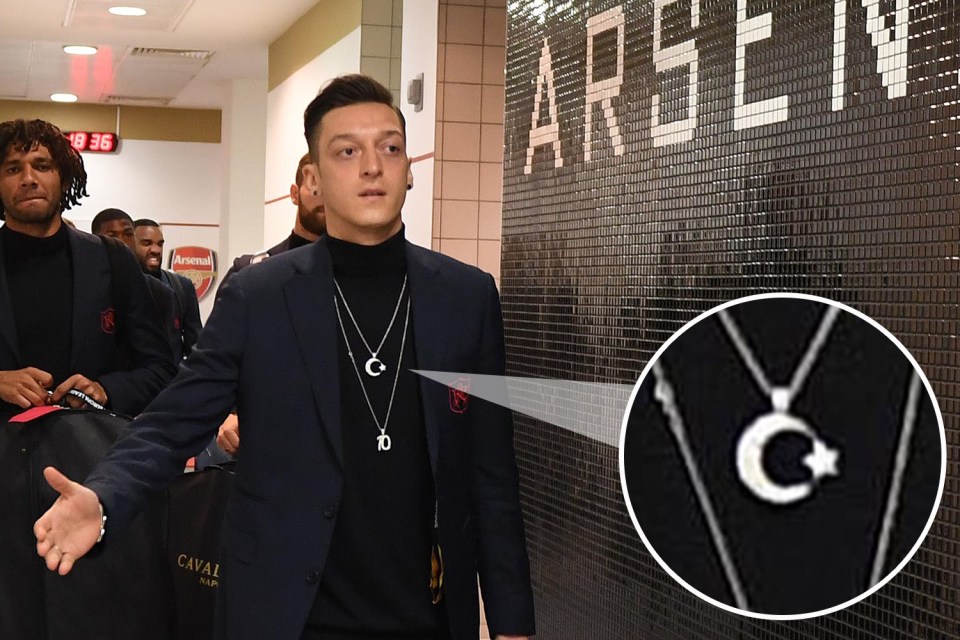  Mesut Ozil wore a chain with the Turkish flag this evening as he arrived at Arsenal's game against Valencia