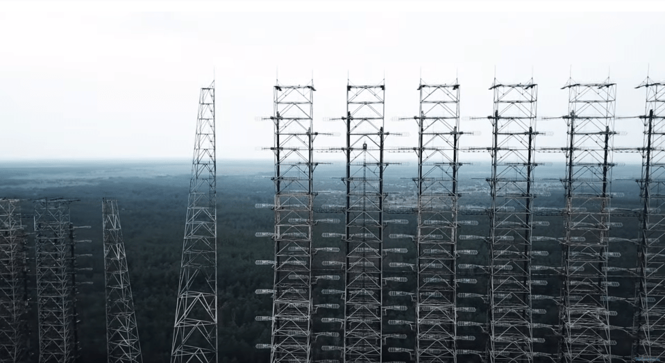  The drone pans over now disused power lines