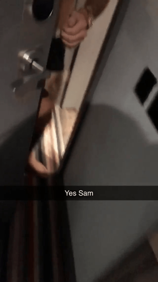 Sam answered the door to his room in his pants