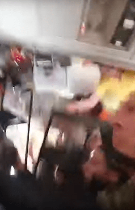  An air steward is sent crashing to the roof of a plane during horrendous turbulence