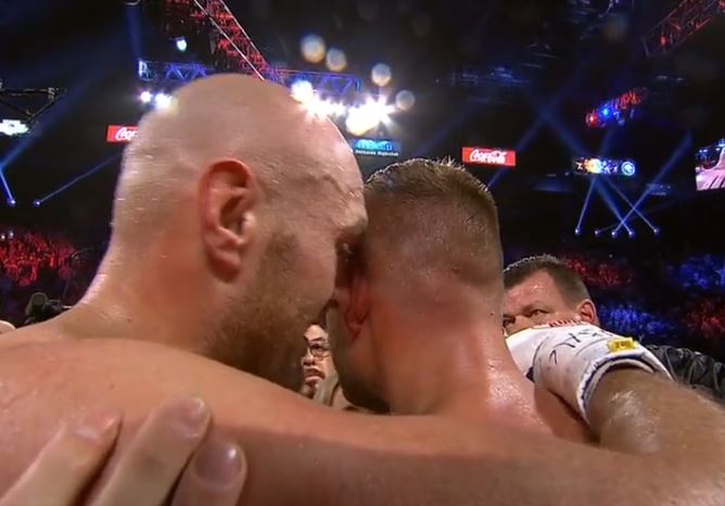  Tyson Fury celebrated his win by landing a combination of kisses on betaen Tom Schwarz