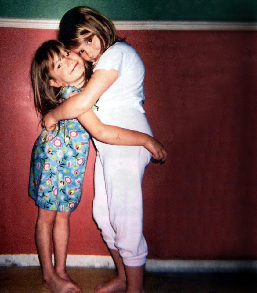 Sarah hugs her little sister Charlotte