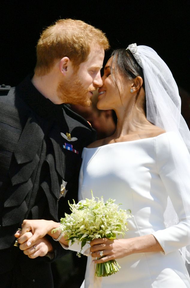  The couple have spoken about their big day as part of the audio guide at an exhibition displaying their wedding outfits