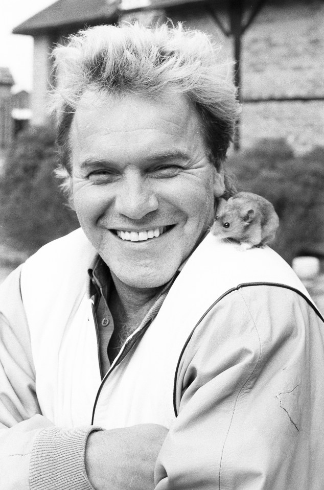  Freddie Starr posing with a hamster after the iconic Sun headline