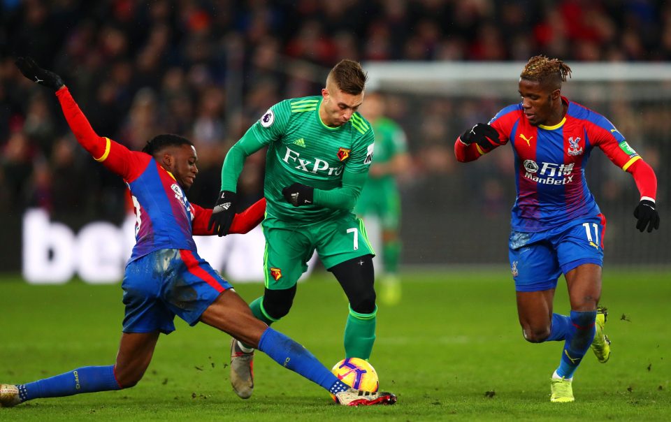  Aaron Wan-Bissaka used to tackle Wilfried Zaha, right, like this in training