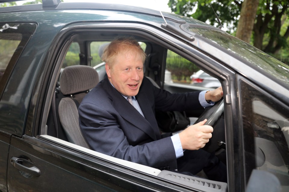  Tory leadership front runner Boris Johnson at the wheel of his Toyota Previa