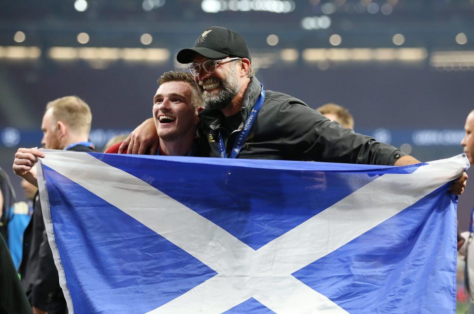  Scotland captain Andrew Robertson celebrates with Jürgen Klopp after winning the Champions League Final.