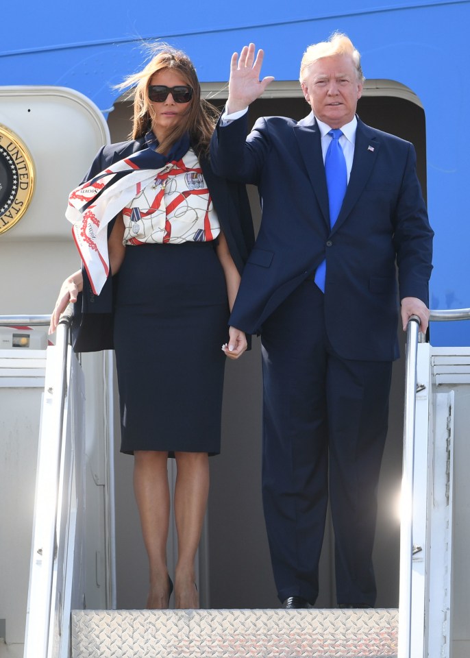 Melania arrived in London in a medal print blouse, just two days before the D-Day anniversary