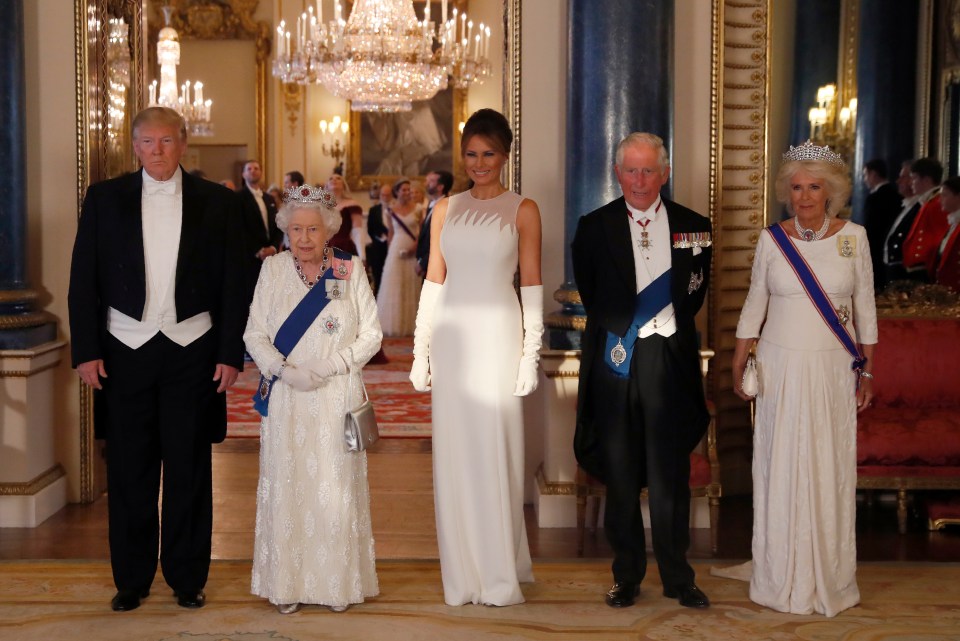 Melania Trump, 49, looked regal at tonight’s State Banquet in a grey floor-length Dior gown as she posed alongside the Queen, President Trump, Prince Charles and Camilla, the Duchess of Cornwall