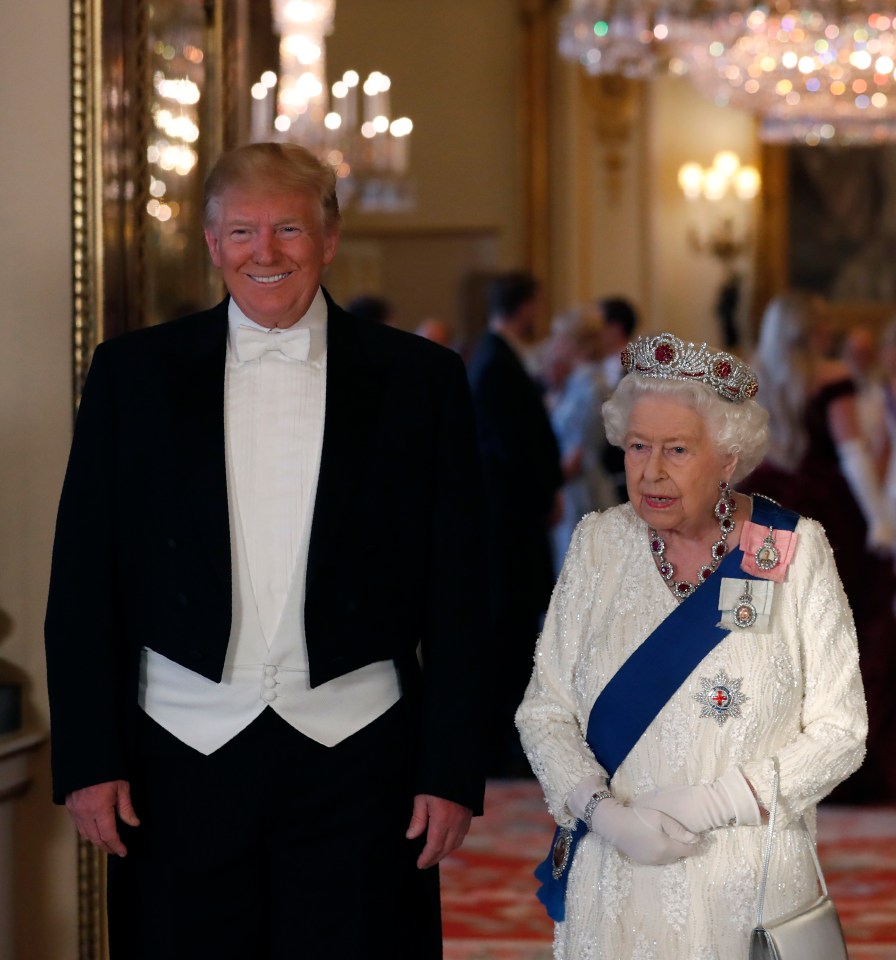  The President smiled as he entered with the Queen