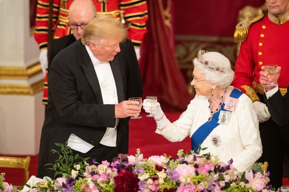  Donald Trump and the Queen sharing a toast at the state banquet