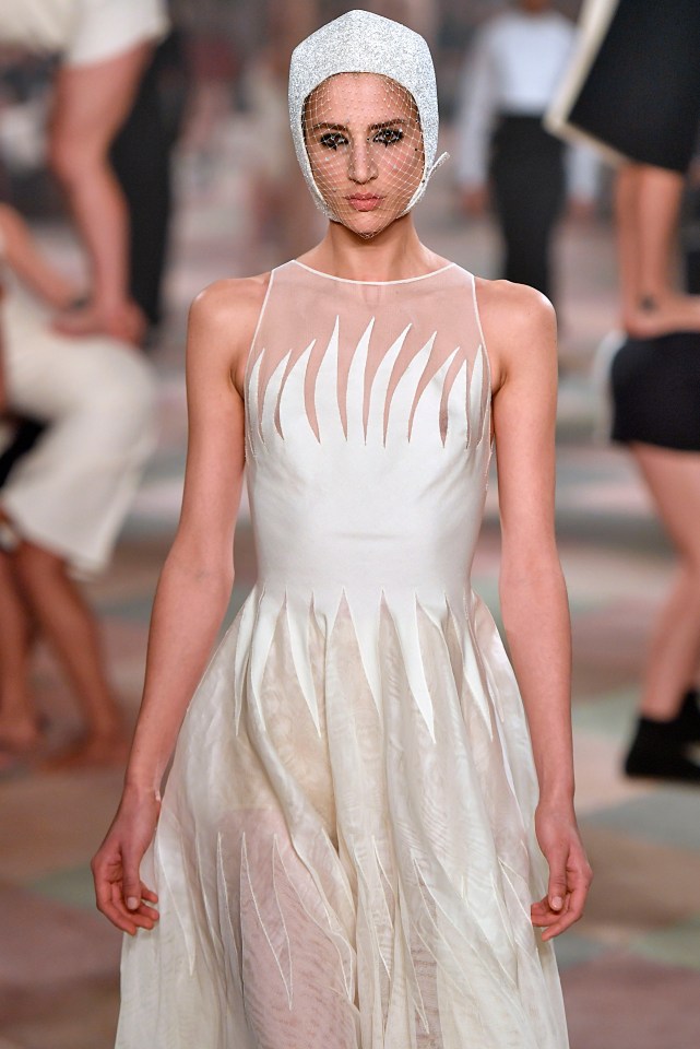 A model walks the runway during the Christian Dior Haute Couture Spring Summer 2019 fashion show as part of Paris Fashion Week in a similar design to Melania’s gown tonight